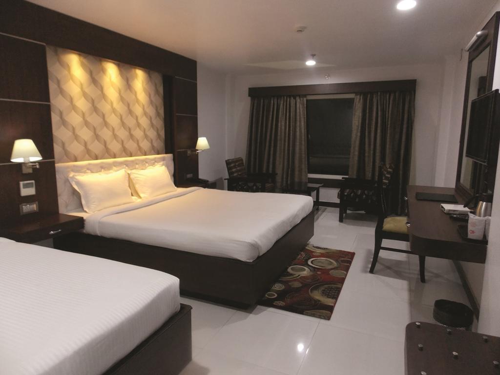 Airport City Hotel Калькутта Номер фото